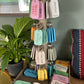 THE WOODEN POSTCARD COMPANY - 96 WOODEN KEY TAGS + FREE TREE STAND: Small key tags (8x4cm RRP £4.95)